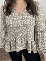 Load image into Gallery viewer, Blossom flowery knit top for women upclose view of floral patten and hem ruffle.
