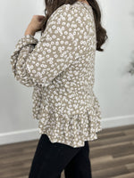 Load image into Gallery viewer, Blossom flowery knit top side view upclose of floral pattern and hi low hemline.
