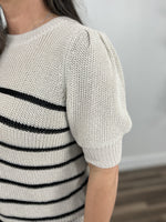 Load image into Gallery viewer, Upclose detailing of the puff short sleeve on the taupe and black striped knit sweater top.
