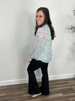 Load image into Gallery viewer, Delaney dressy flower print top side view of chiffon sleeves.
