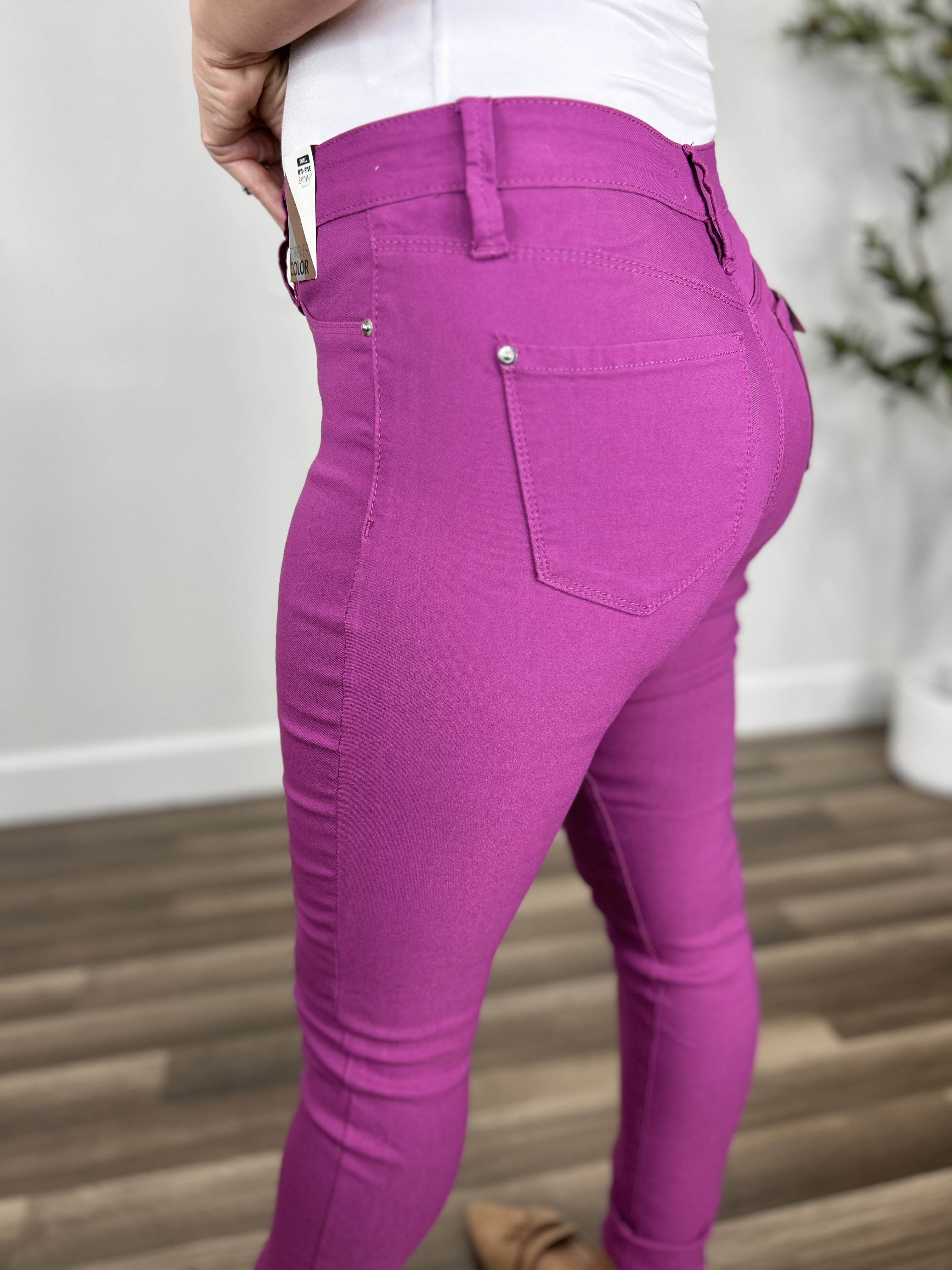 back pocket view of the women's Fletcher Stretch Skinny Pants in Berry