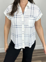 Load image into Gallery viewer, Franklin plaid button down top showing off buttons, chest pocket, and short sleeves. Upclose view.
