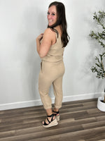 Load image into Gallery viewer, Back view of the Kaytan pocketed sleeveless jumpsuit. Showing rounded back neck and side pockets.
