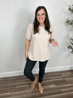 Load image into Gallery viewer, Lacy Cable Knit Top paired with charcoal skinny jeans and camel color flat shoes.

