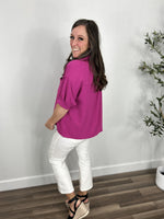 Load image into Gallery viewer, Back view of the meg magenta button up top with puff short sleeves.
