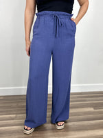 Load image into Gallery viewer, Women&#39;s blue linen blend wide leg pant with adjustable waist tie.
