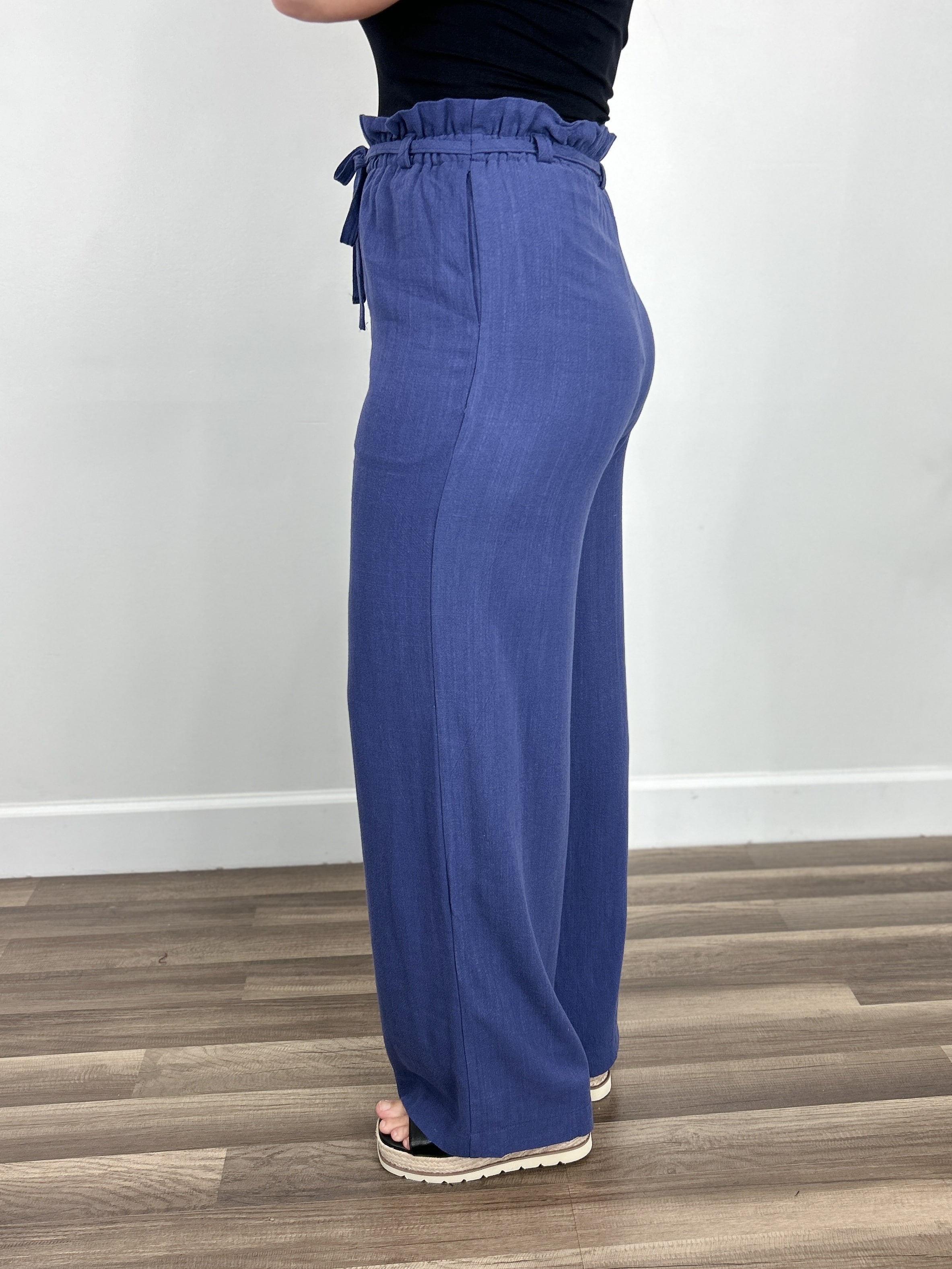Back view of the women's linen wide leg pant in blue.