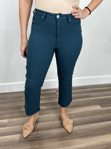 Upclose view of the women's Wyatt stretch flare crop pants in teal