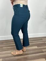 Load image into Gallery viewer, Side view of the Wyatt stretch flare crop pants in teal with back functioning packets.
