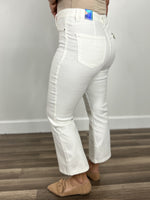 Load image into Gallery viewer, Side view of the women&#39;s white Wyatt stretchy flare cropped pants.
